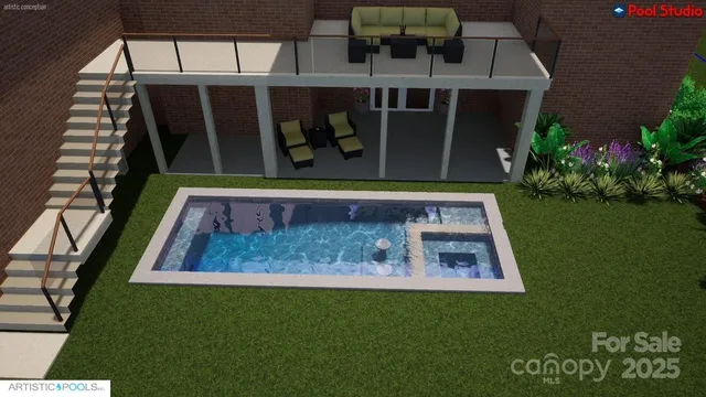 an aerial view of a house with a garden and lake view