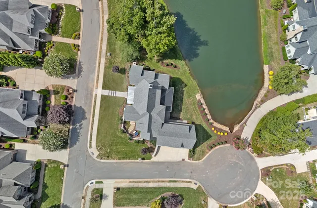 an aerial view of a house with a garden