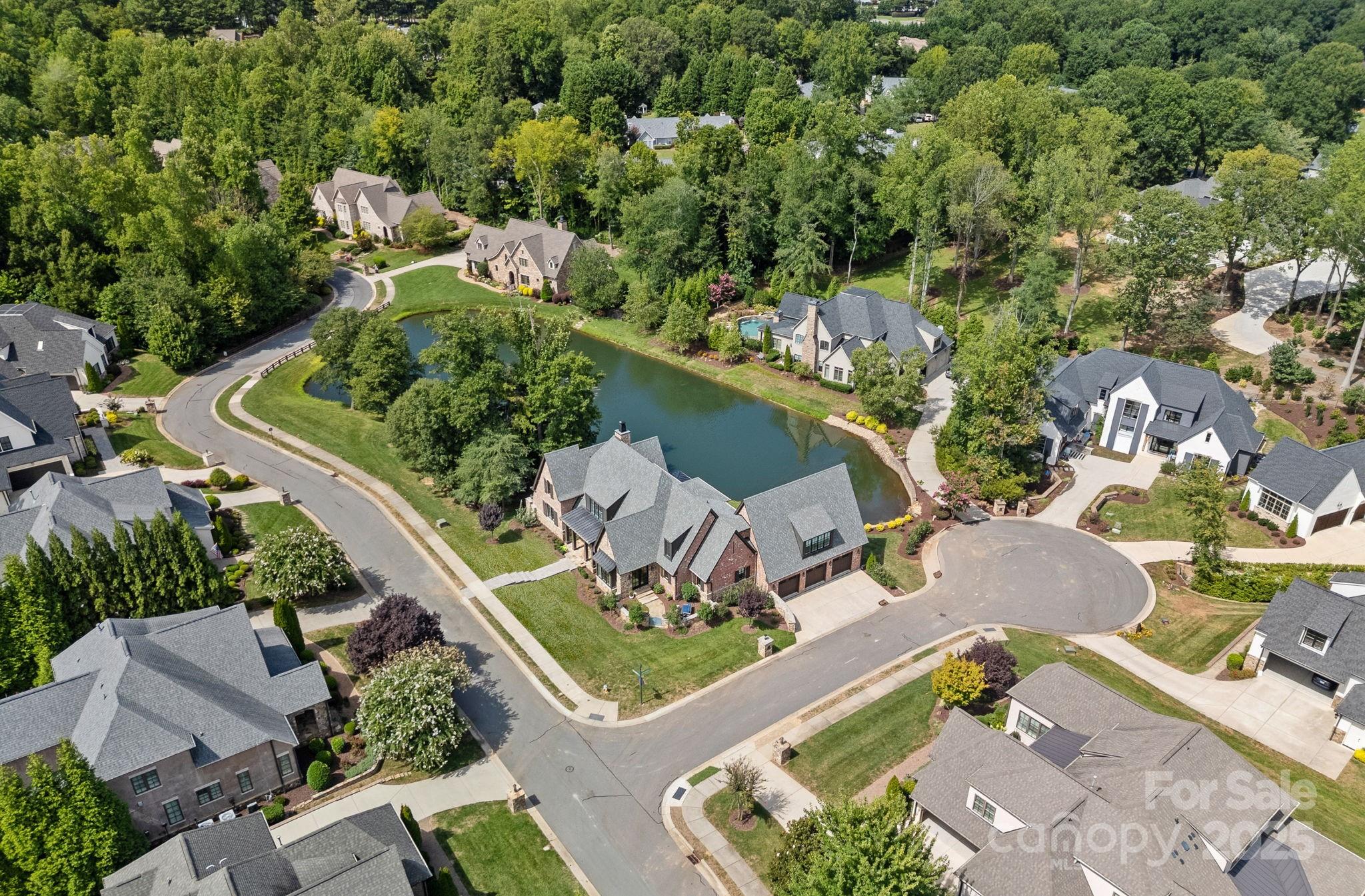 21216 Olde Quarry Lane Cornelius, NC 28031 - Photo 48 of 48 an aerial view of a house with a garden