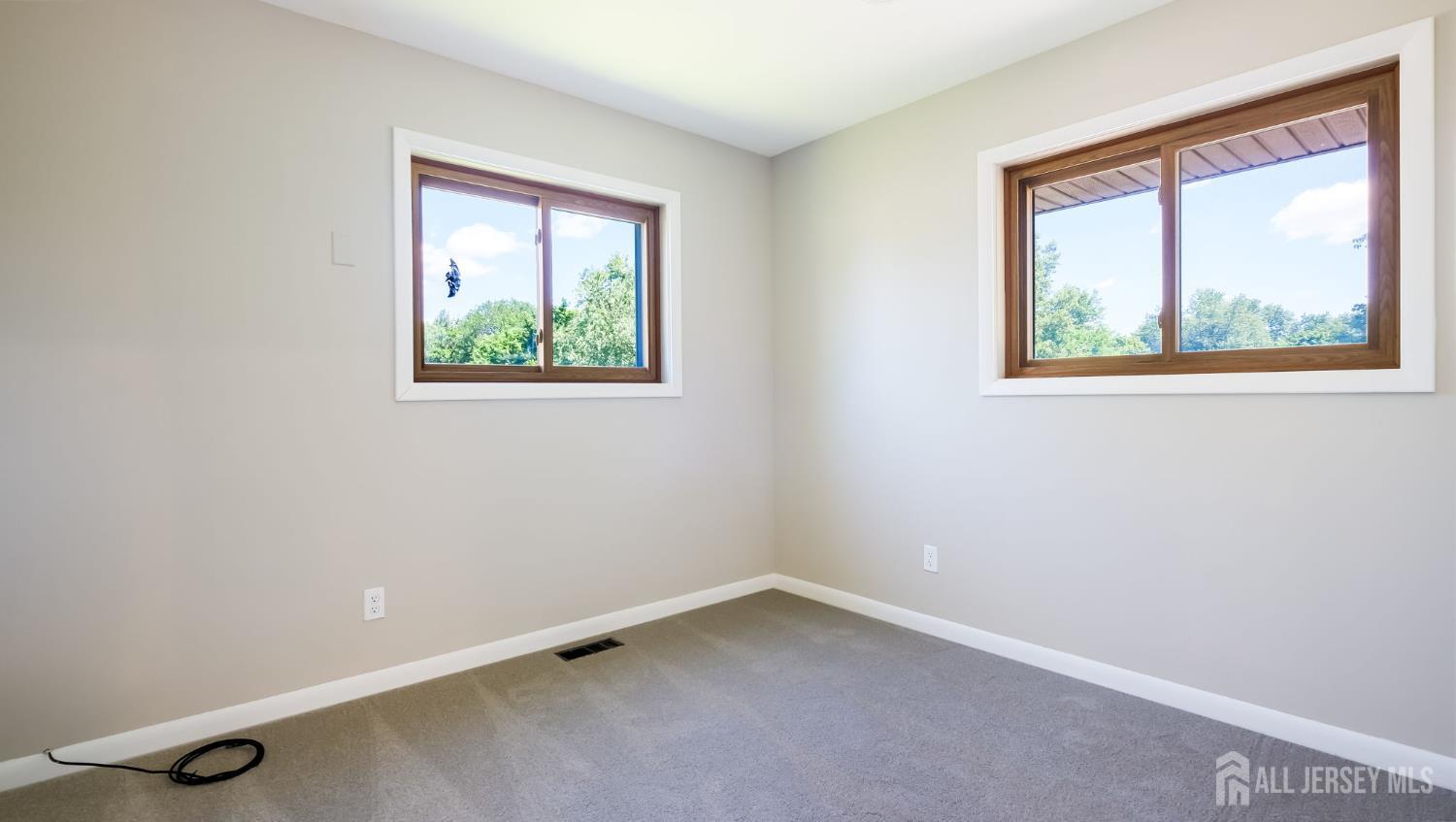 50 Sand Hills Road Kendall Park, NJ 08824 - Photo 18 of 27 an empty room with a window