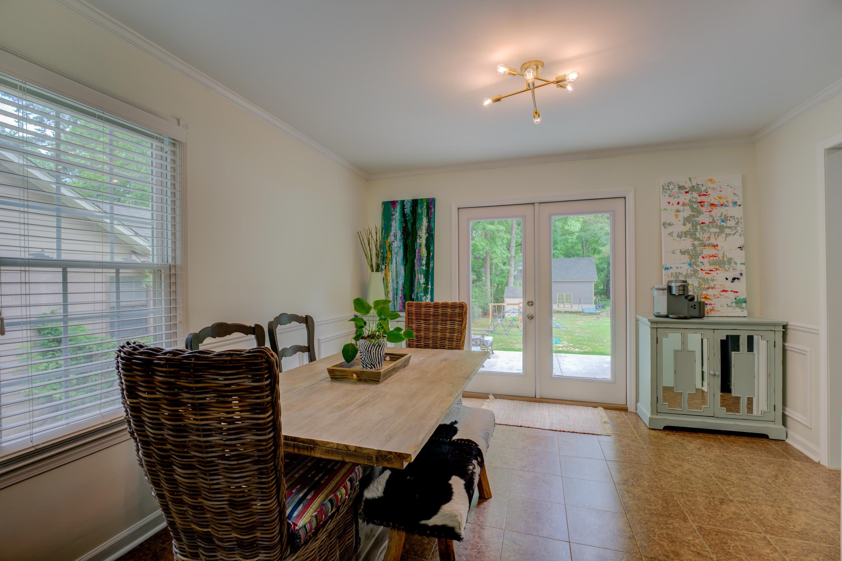 316 Dove Valley Road Collierville, TN 38017 - Photo 10 of 21 a view of a dining room with furniture window and outside view