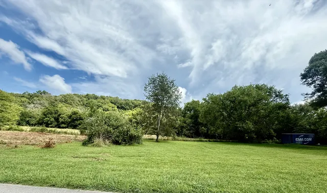 a view of an outdoor space and a yard