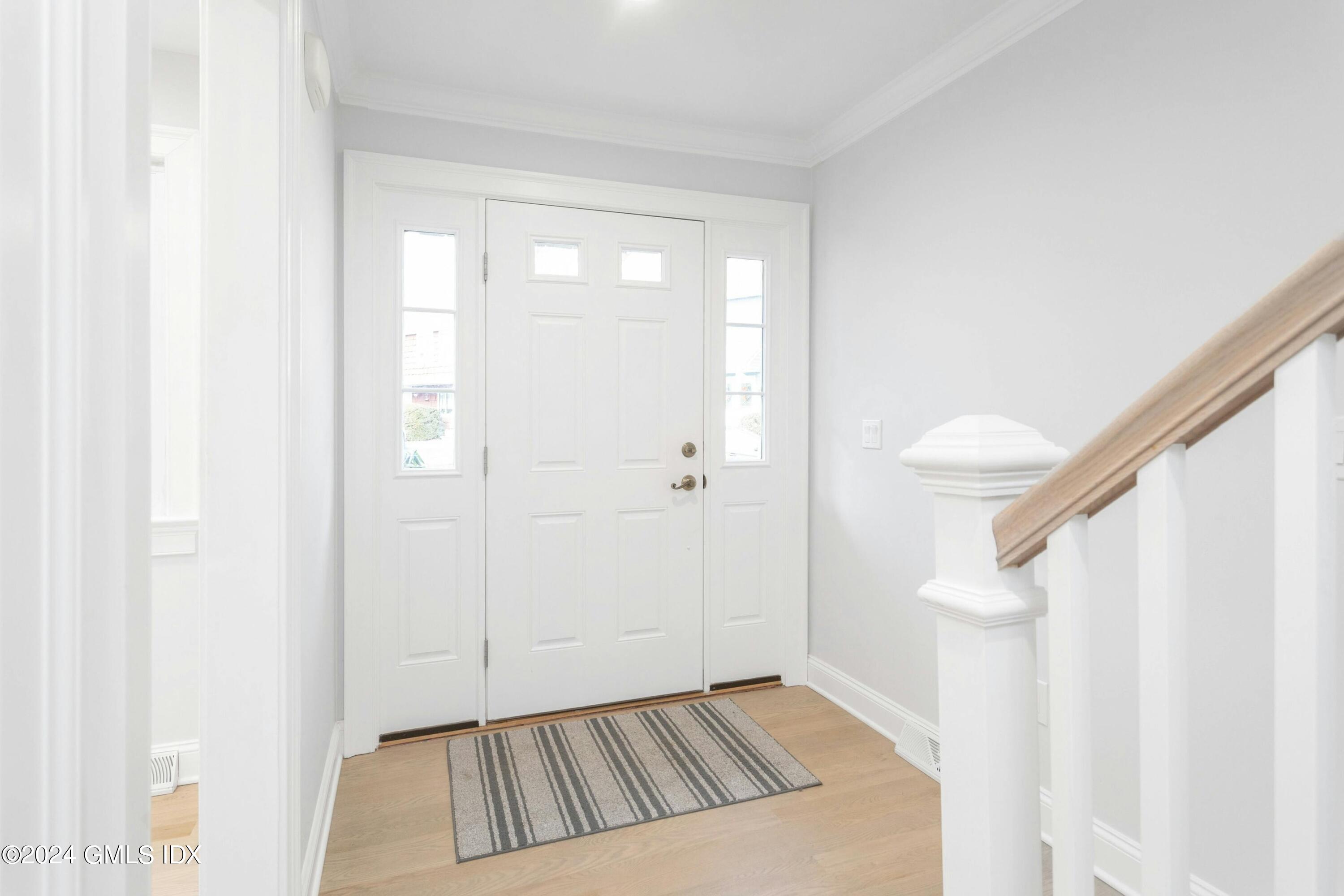 37 Sheep Hill Road, Unit 12 Riverside, CT 06878 - Photo 3 of 23 a view of an front door