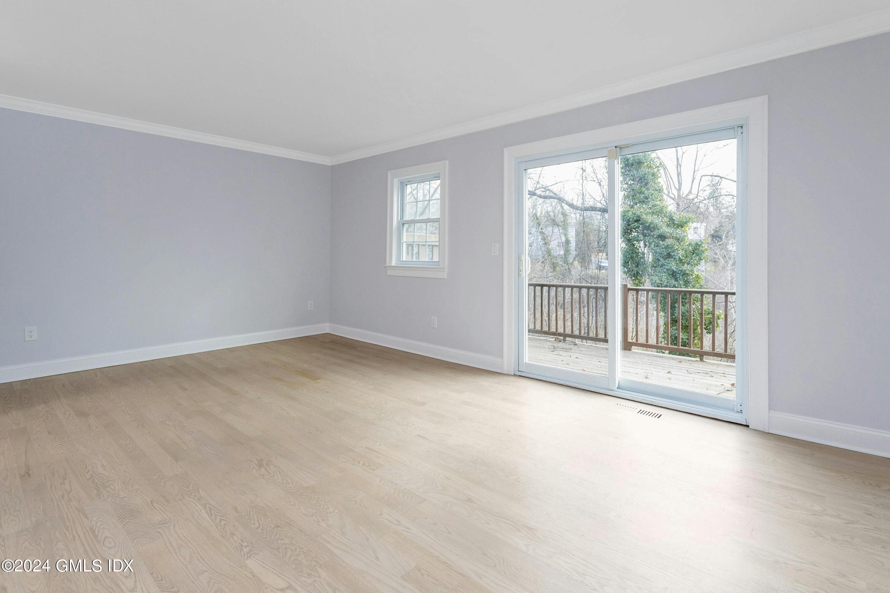 37 Sheep Hill Road, Unit 12 Riverside, CT 06878 - Photo 9 of 23 a view of an empty room with a window