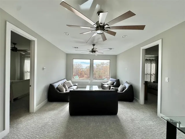 a living room with furniture and window