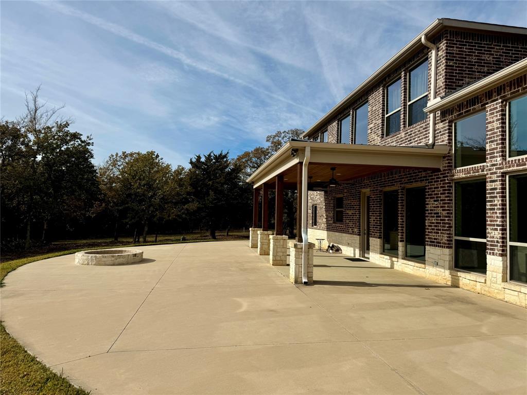 474 Eagle Cove Circle Tioga, TX 76271 - Photo 21 of 26 a house with trees in front of it