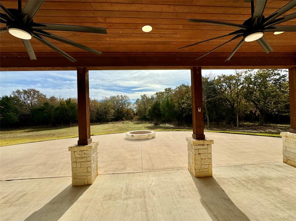 474 Eagle Cove Circle Tioga, TX 76271 - Photo 22 of 26 a view of a patio with a table chairs and a patio