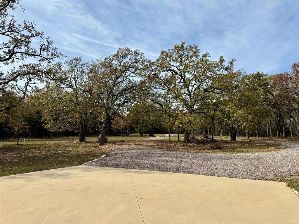 474 Eagle Cove Circle Tioga, TX 76271 - Photo 23 of 26 a view of a house with a yard