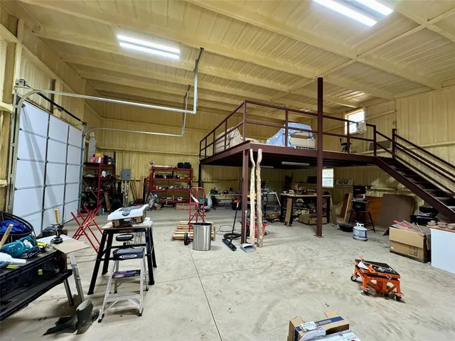 a view of a storage room with furniture
