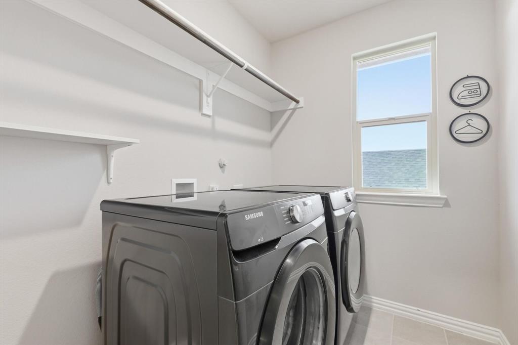 4125 Caprock Canyon Road Sachse, TX 75048 - Photo 28 of 40 a utility room with dryer and washer