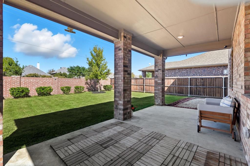 4125 Caprock Canyon Road Sachse, TX 75048 - Photo 29 of 40 a house view with a garden space