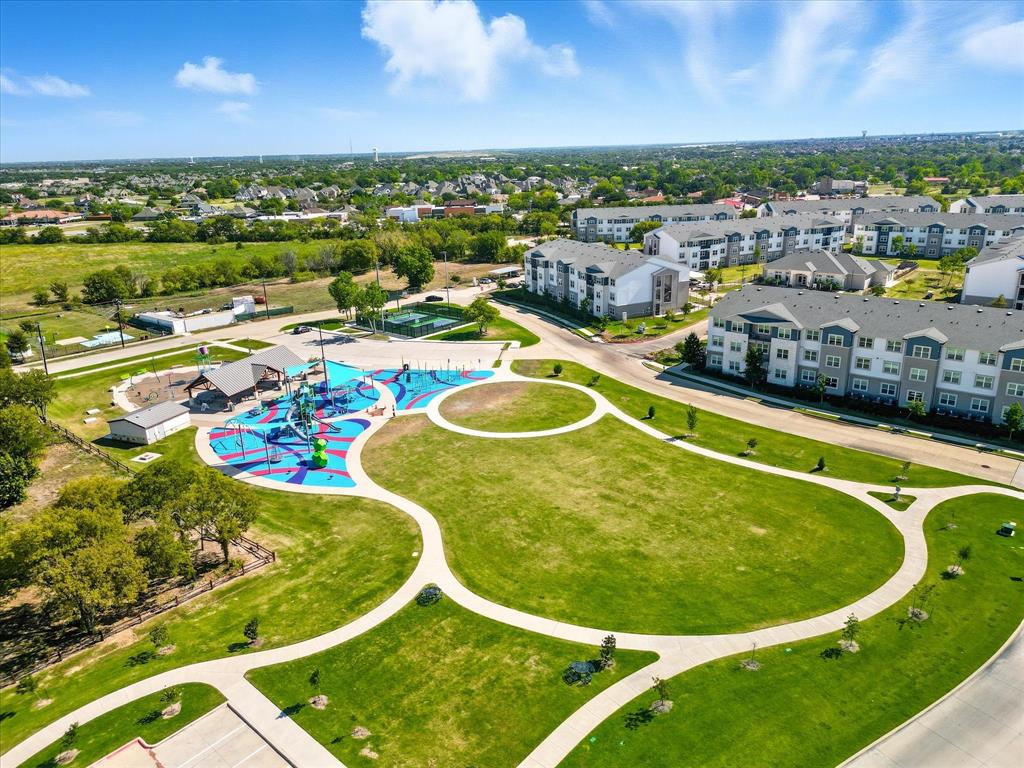 4125 Caprock Canyon Road Sachse, TX 75048 - Photo 36 of 40 a view of a pool in a backyard