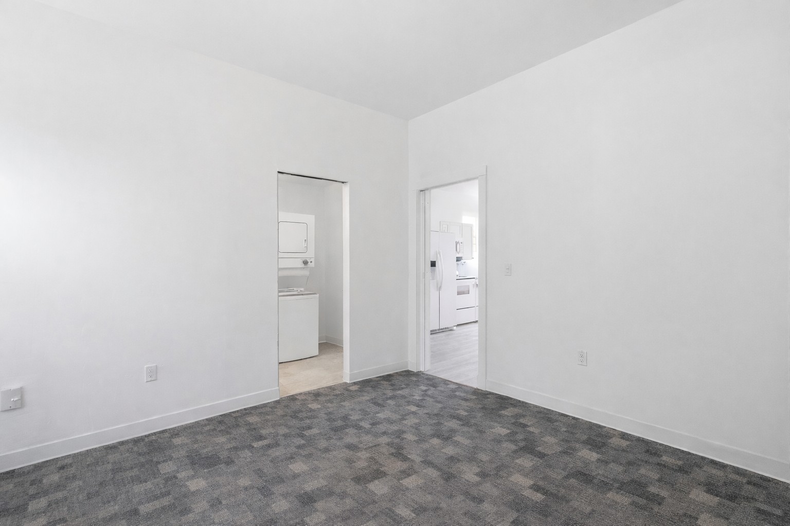 224 Old Coach Lane Elgin, TX 78621 - Photo 13 of 25 This room features clean white walls and a gray patterned carpet