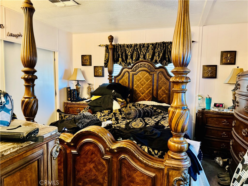 13393 Mariposa Road, Unit 281 Victorville, CA 92395 - Photo 13 of 16 a view of a room with gym equipment