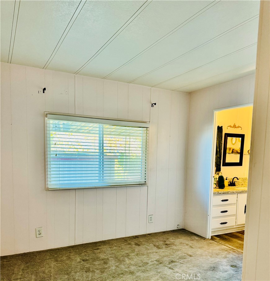 13393 Mariposa Road, Unit 281 Victorville, CA 92395 - Photo 9 of 16 a view of a room that has a window in it