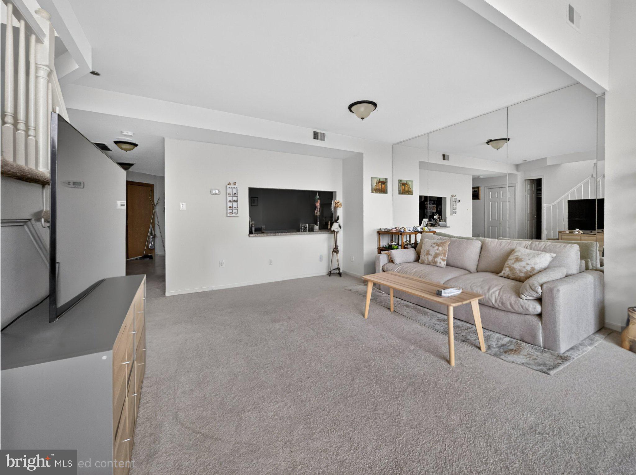 1301 North Courthouse Road, Unit 1803 Arlington, VA 22201 - Photo 11 of 33 Spacious, light-filled living area.