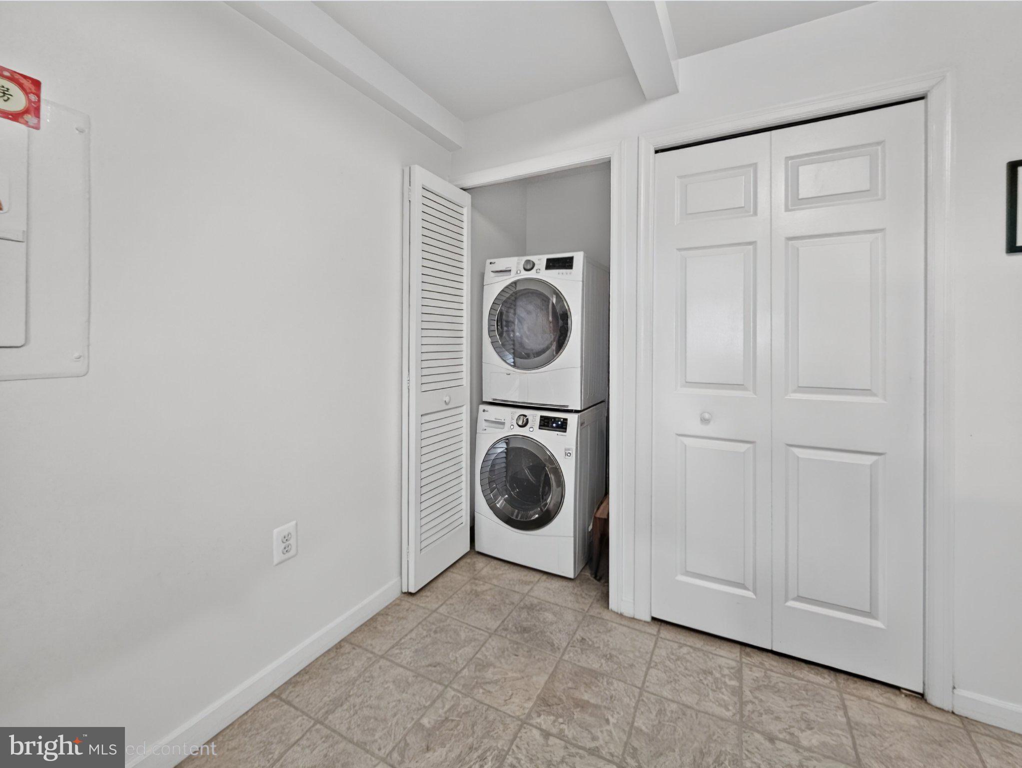 1301 North Courthouse Road, Unit 1803 Arlington, VA 22201 - Photo 16 of 33 Efficient laundry nook in bright space.