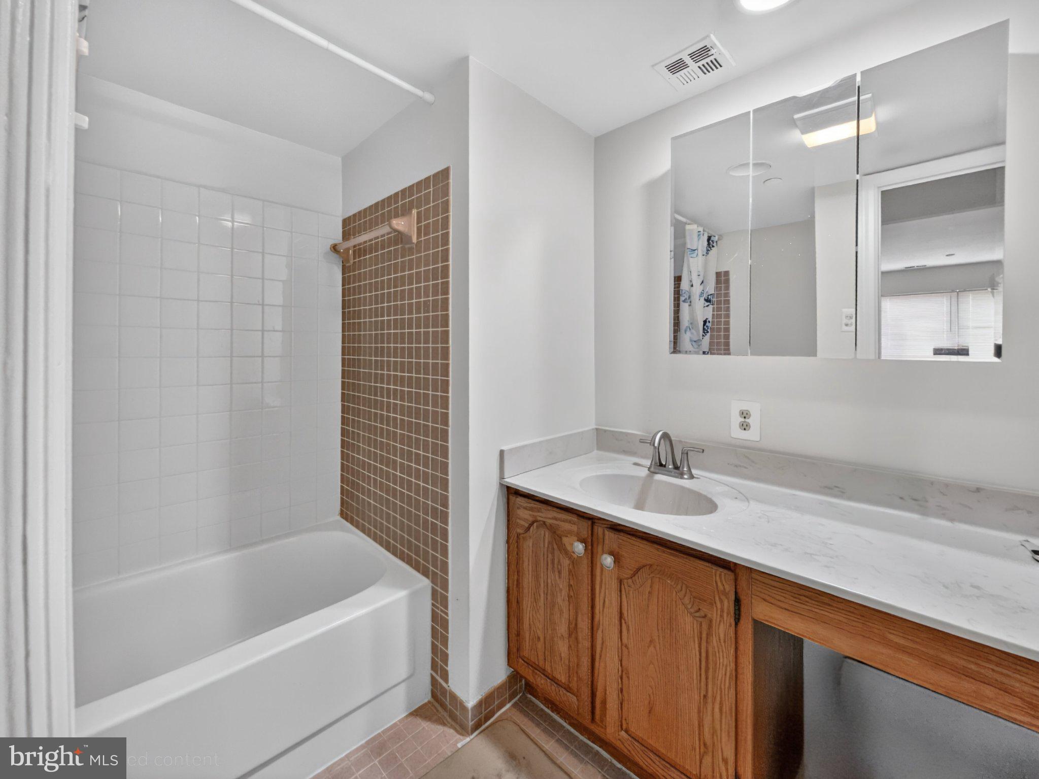 1301 North Courthouse Road, Unit 1803 Arlington, VA 22201 - Photo 17 of 33 Modern bathroom with sleek finishes.