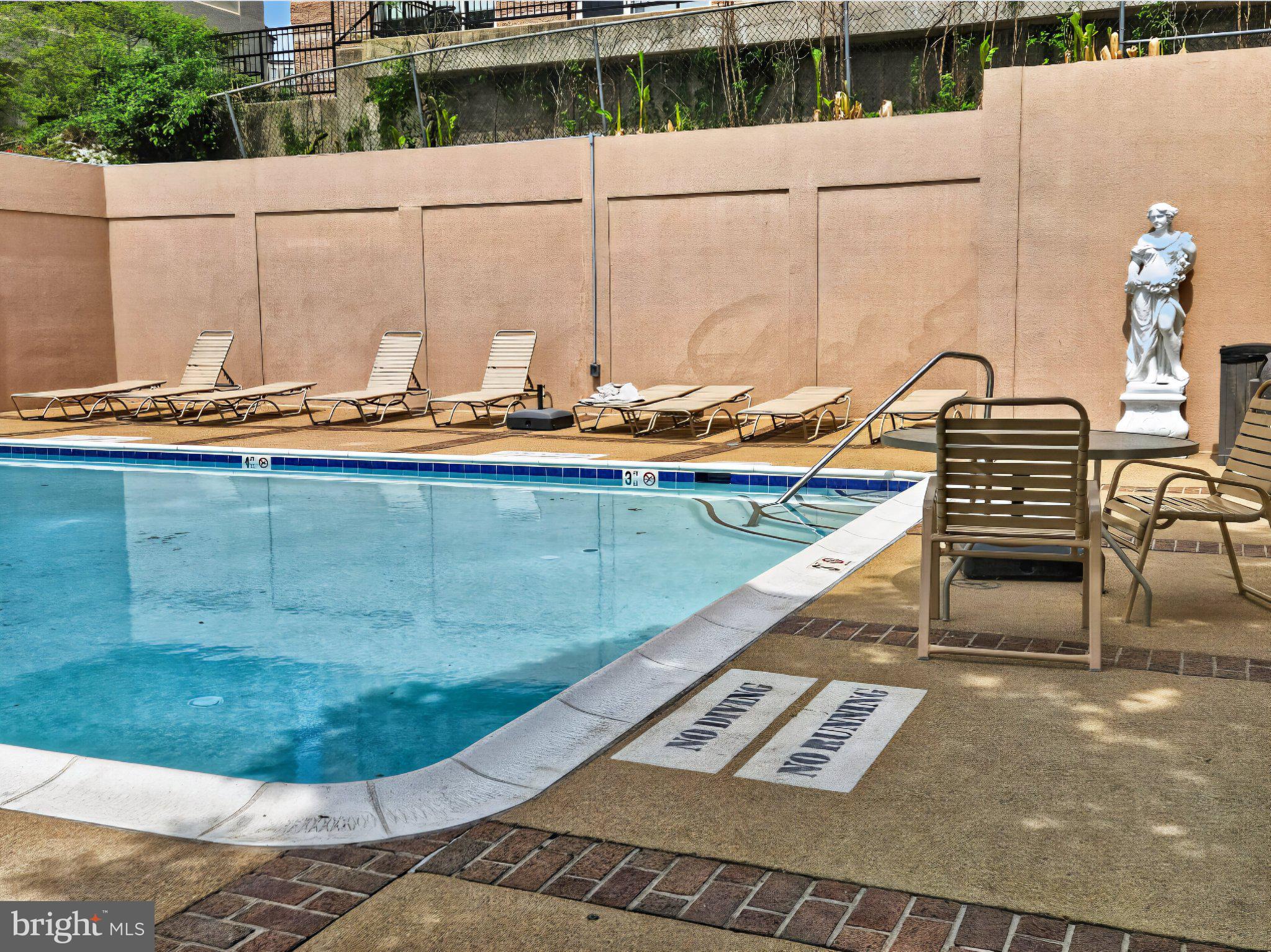 1301 North Courthouse Road, Unit 1803 Arlington, VA 22201 - Photo 29 of 33 Serene poolside retreat awaits you.