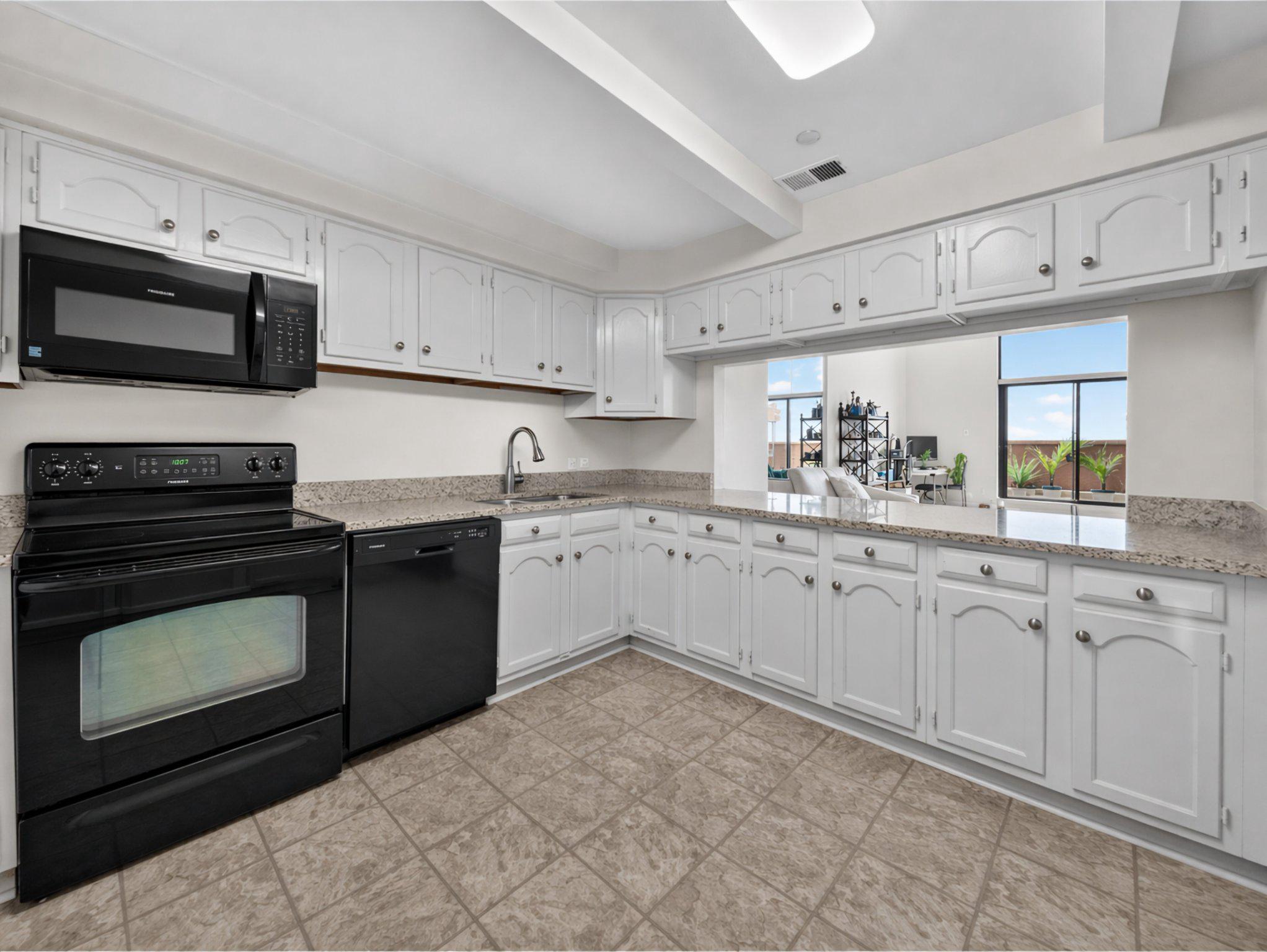 1301 North Courthouse Road, Unit 1803 Arlington, VA 22201 - Photo 6 of 33 Airy eat-in kitchen open to living room.