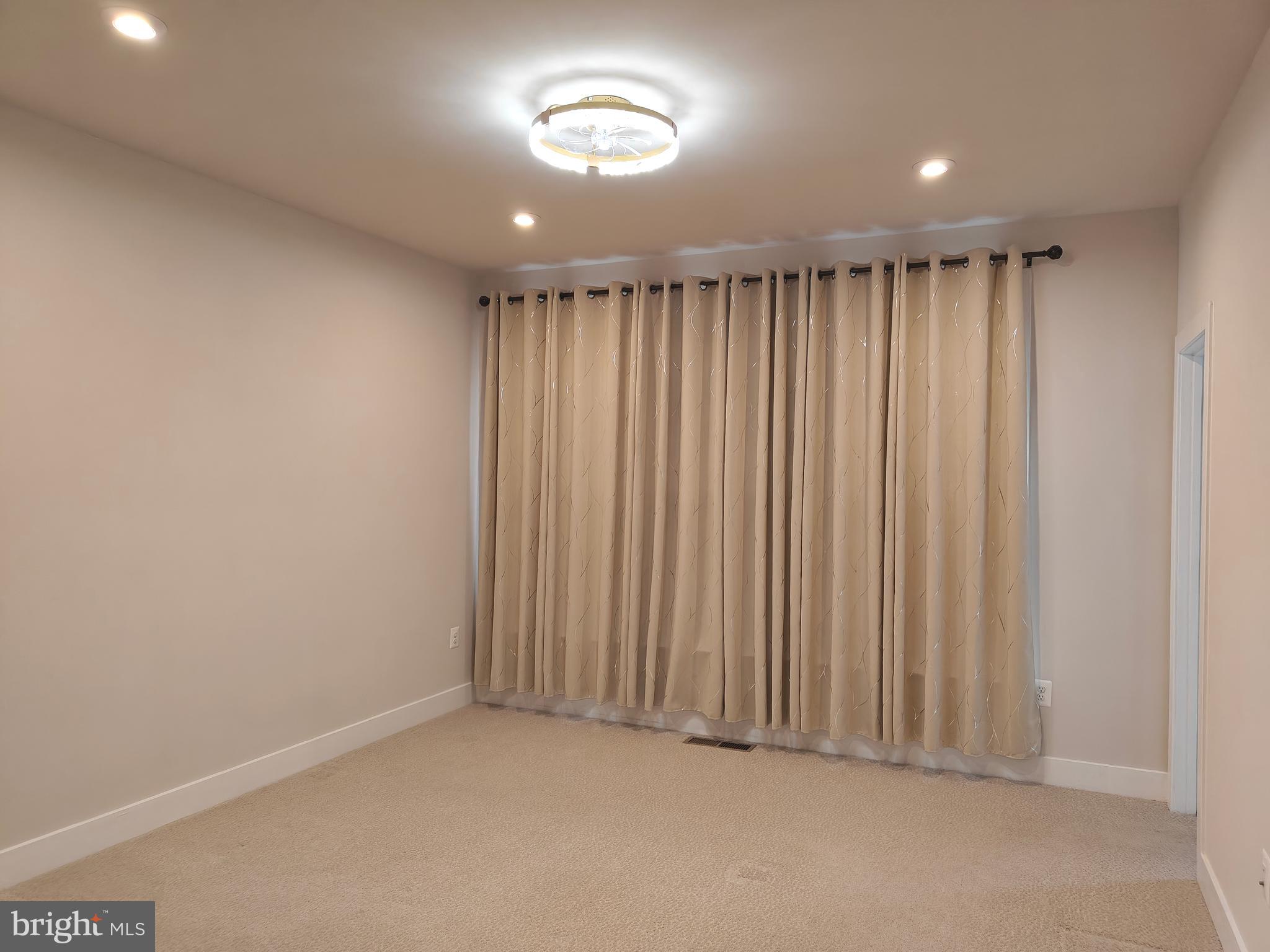 2393 Liberty Loop Herndon, VA 20171 - Photo 20 of 45 an empty room with a window