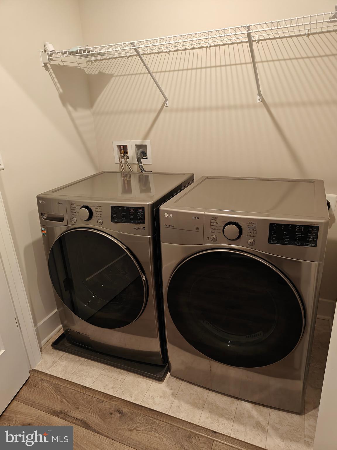 2393 Liberty Loop Herndon, VA 20171 - Photo 26 of 45 a utility room with dryer and washer