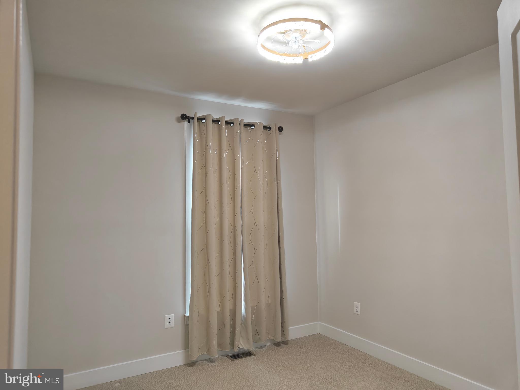 2393 Liberty Loop Herndon, VA 20171 - Photo 31 of 45 an empty room with a window
