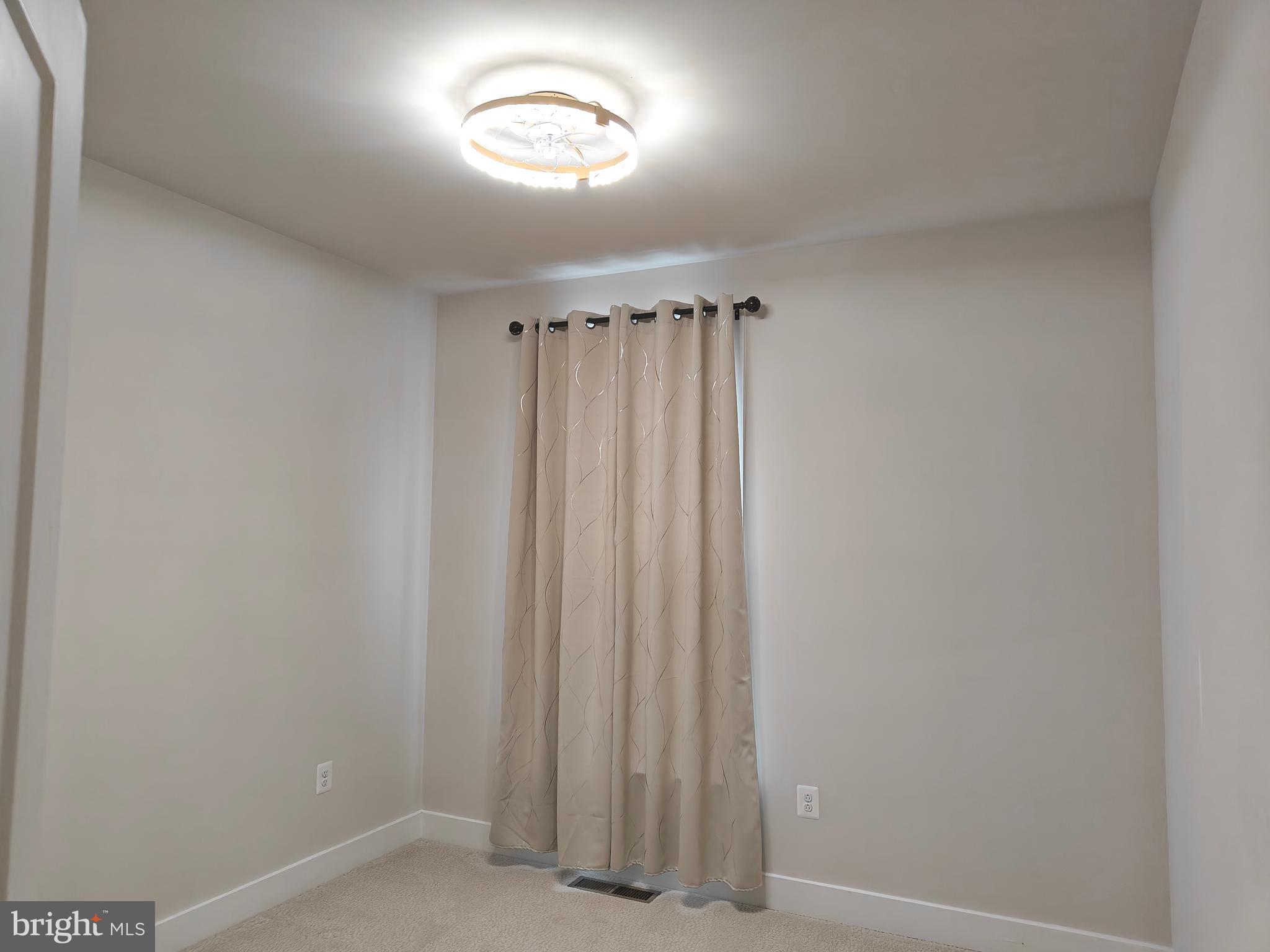2393 Liberty Loop Herndon, VA 20171 - Photo 32 of 45 a view of a room with a window