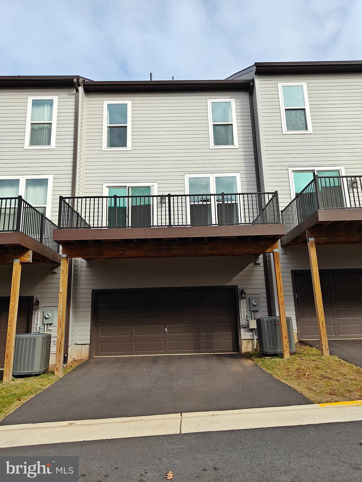 2393 Liberty Loop Herndon, VA 20171 - Photo 38 of 45 a view of a house with wooden stairs