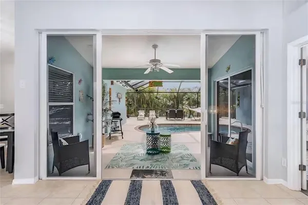 a view of swimming pool with a patio