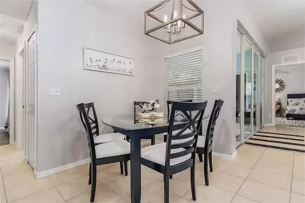 a bedroom with two beds and a window