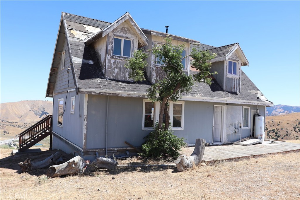 a front view of a house with yard