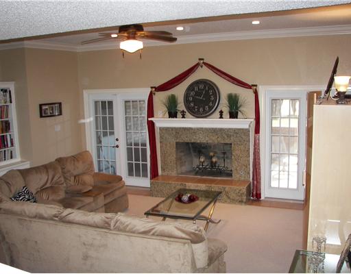7006 Brandon Drive Corpus Christi, TX 78413 - Photo 2 of 8 a living room with furniture and a fireplace