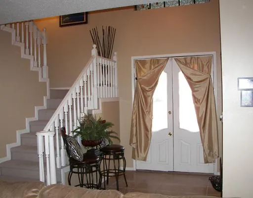 a view of balcony and furniture