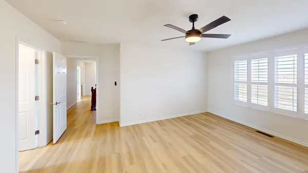 a bathroom with a double vanity sink and mirror