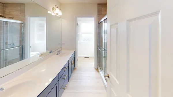 a bathroom with a toilet and a sink