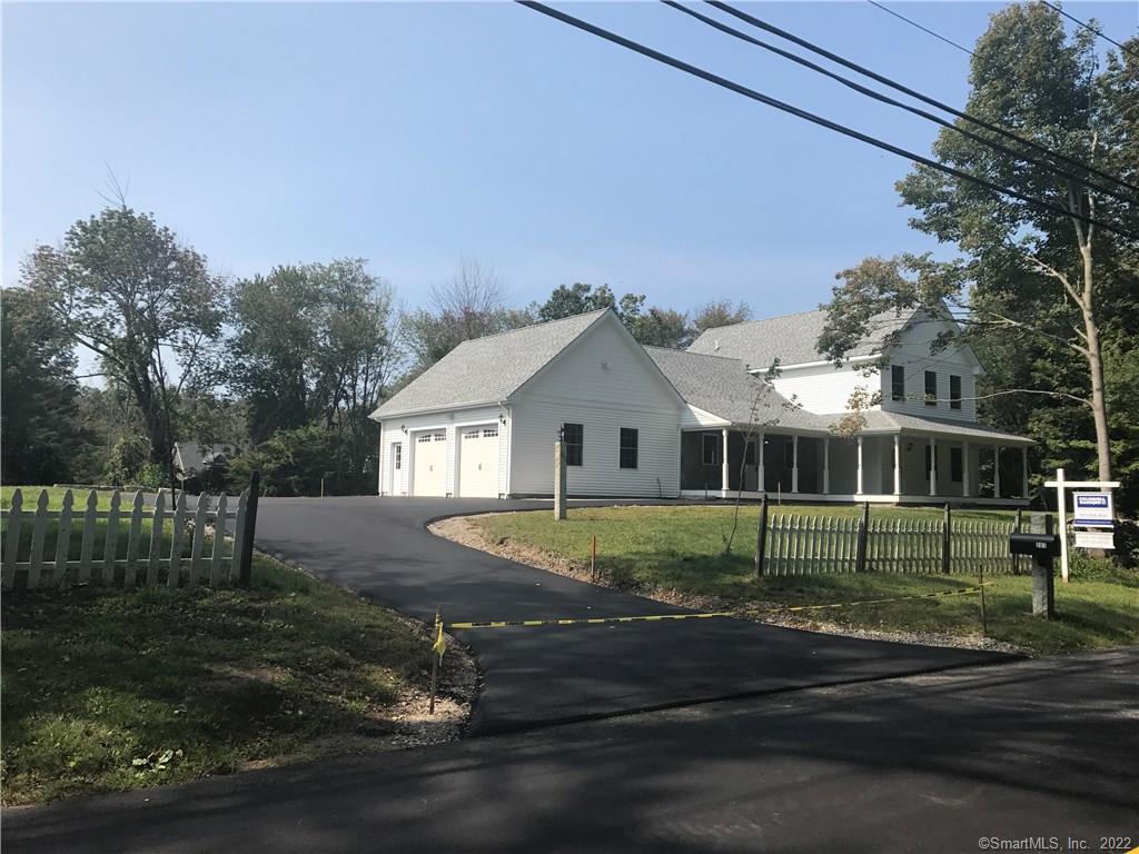 207 Riggs Street Oxford, CT 06478 - Photo 1 of 1 a front view of a house with garden