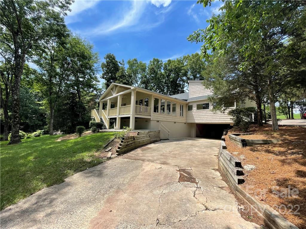 4039 Rounding Run Road Charlotte, NC 28277 - Photo 26 of 28 a view of a house with a yard