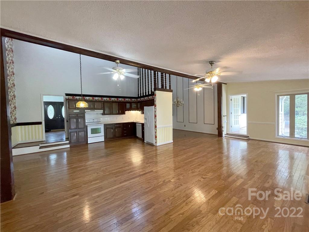 4039 Rounding Run Road Charlotte, NC 28277 - Photo 8 of 28 a view of empty room with wooden floor