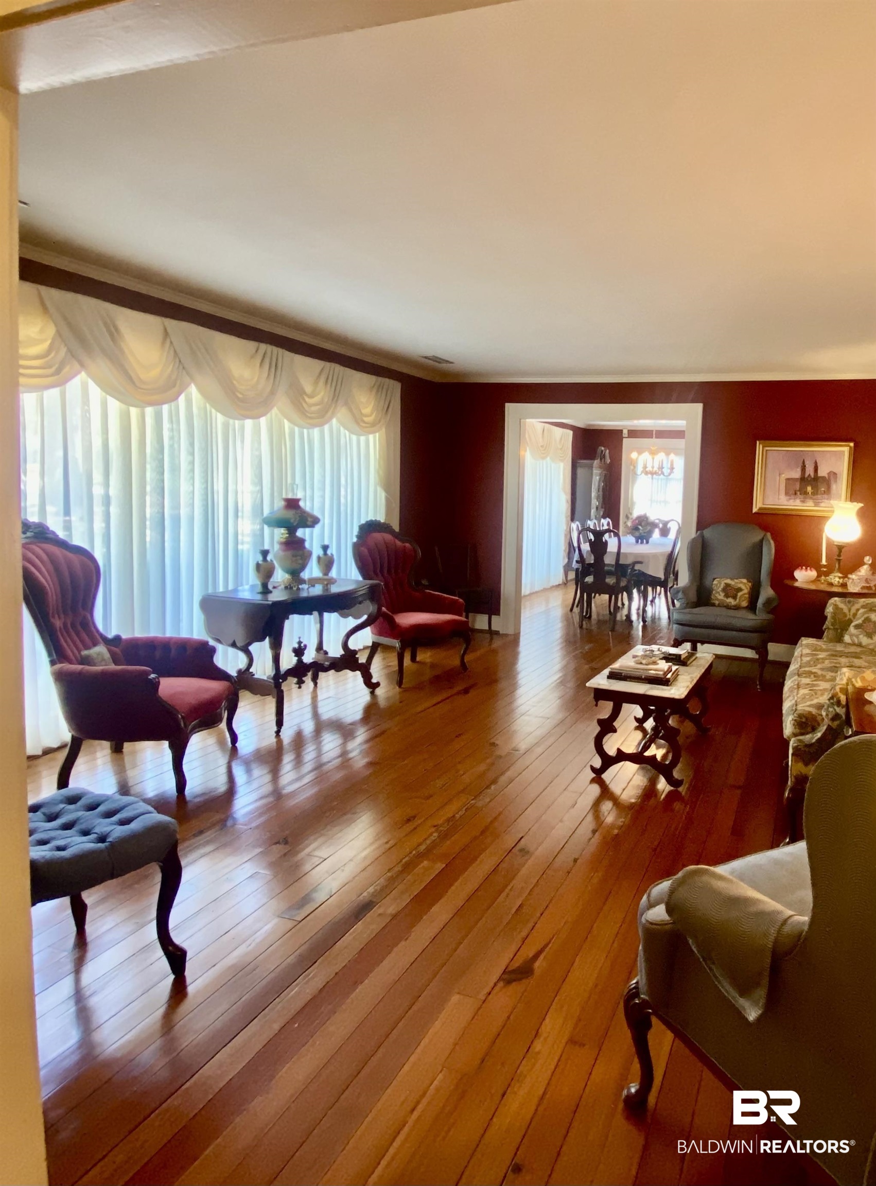 Living room featuring hardwood / wood-style floors.