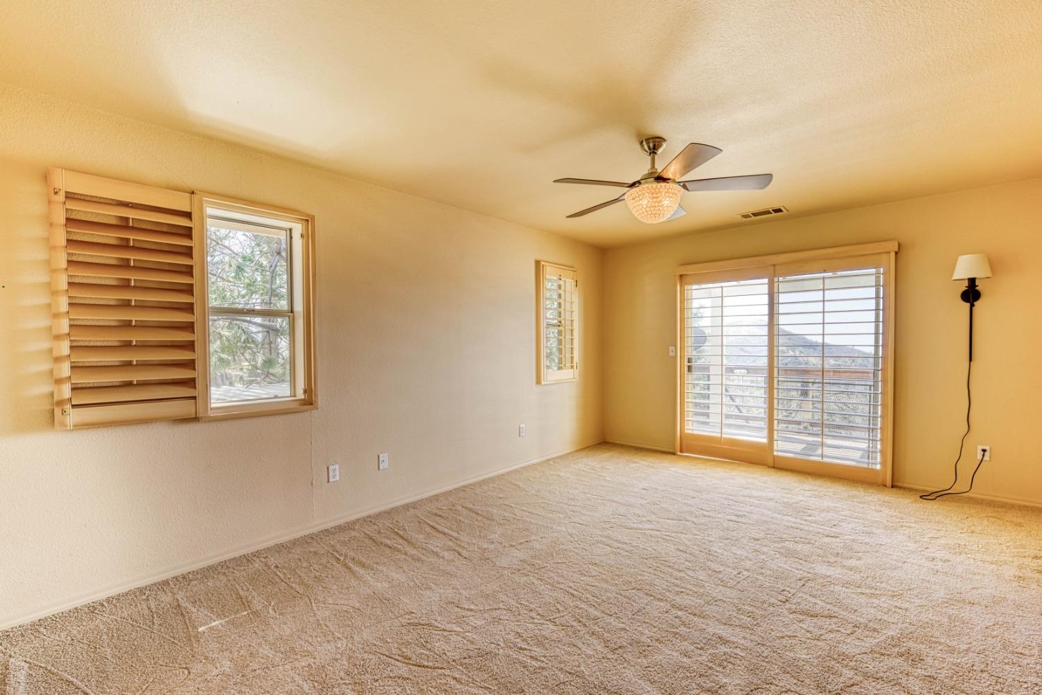 34201 Natoma Road Auberry, CA 93602 - Photo 15 of 40 a view of an empty room with a window