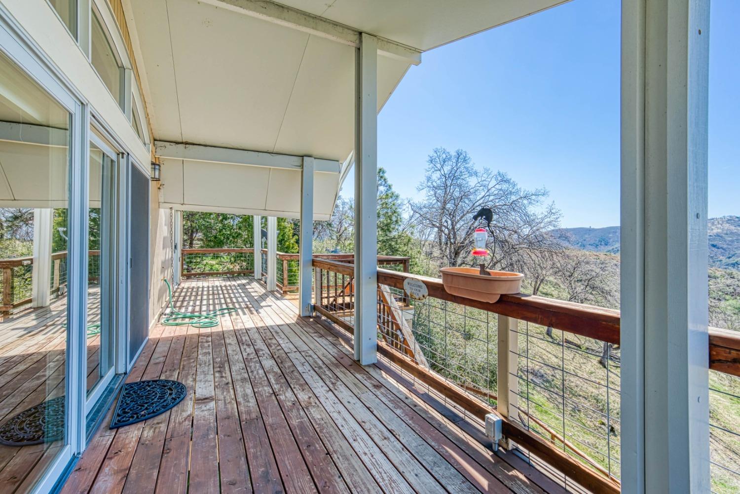 34201 Natoma Road Auberry, CA 93602 - Photo 19 of 40 a view of a balcony with wooden floor