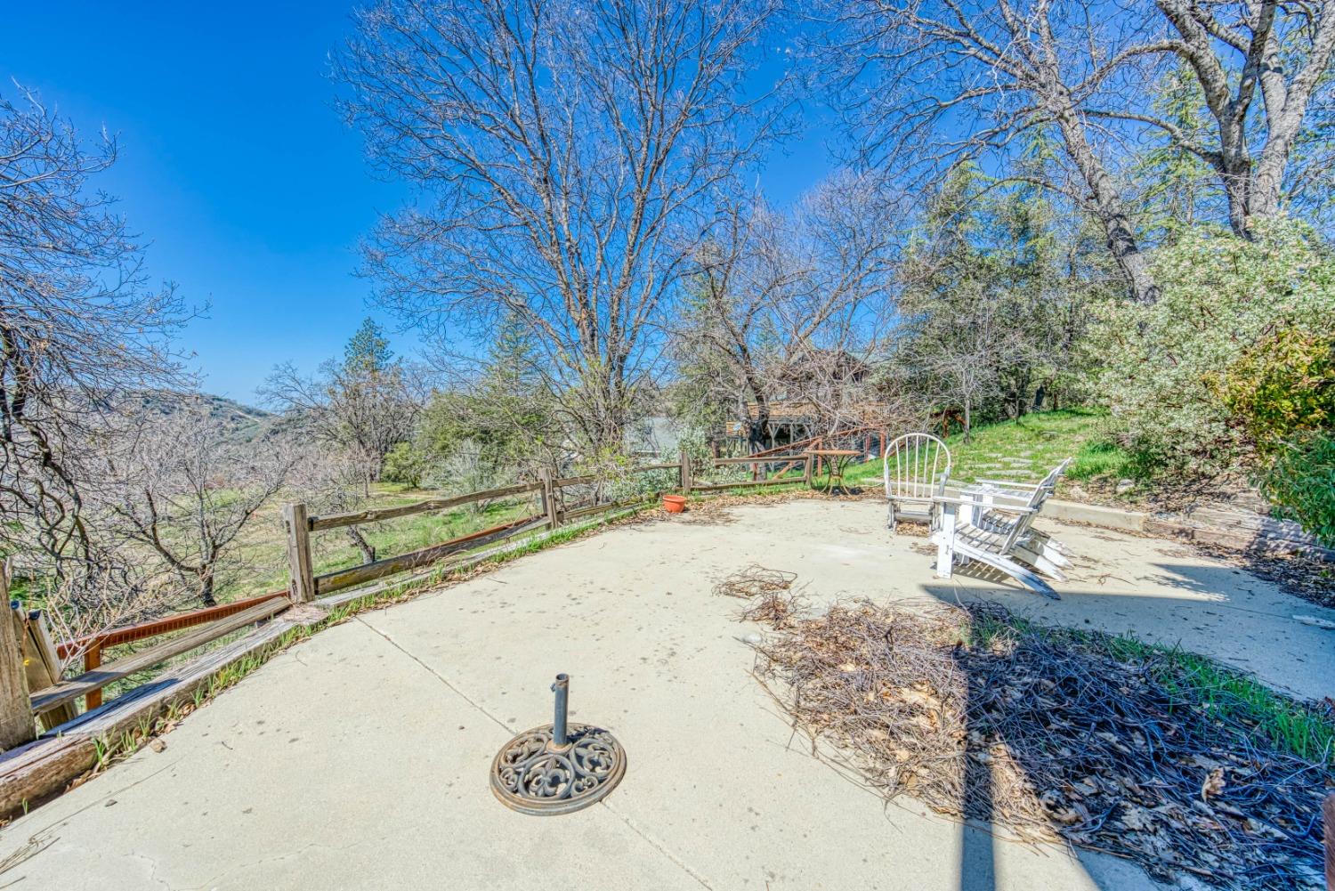 34201 Natoma Road Auberry, CA 93602 - Photo 23 of 40 a view of a yard with an trees