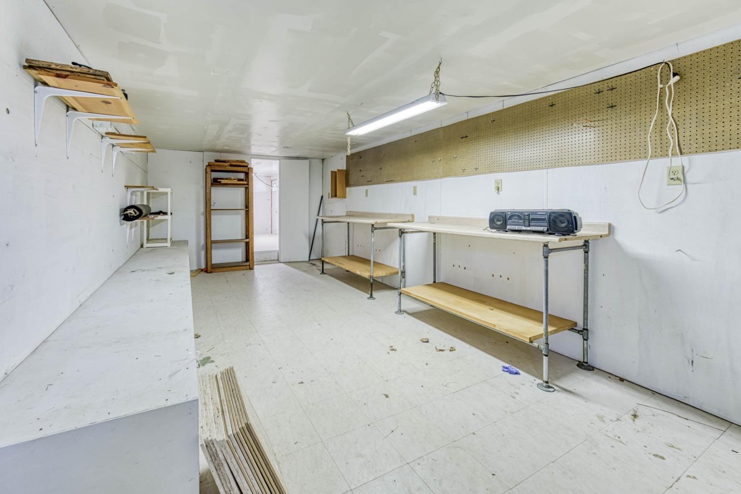 34201 Natoma Road Auberry, CA 93602 - Photo 29 of 40 a view of a room with gym equipment