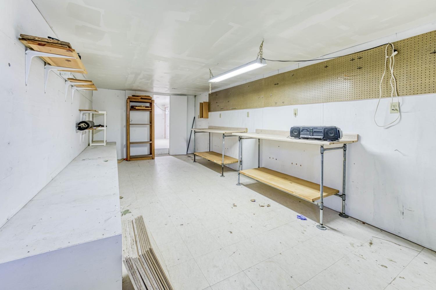 34201 Natoma Road Auberry, CA 93602 - Photo 30 of 40 a view of a room with gym equipment