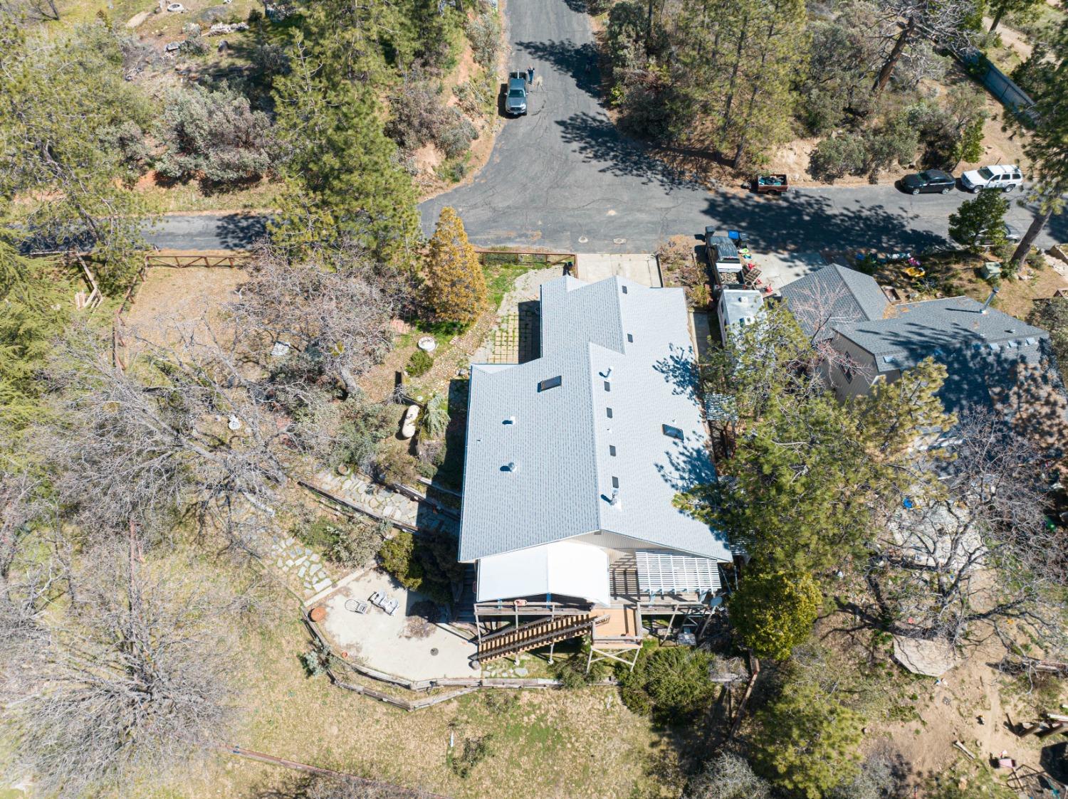 34201 Natoma Road Auberry, CA 93602 - Photo 33 of 40 an aerial view of residential houses with outdoor space