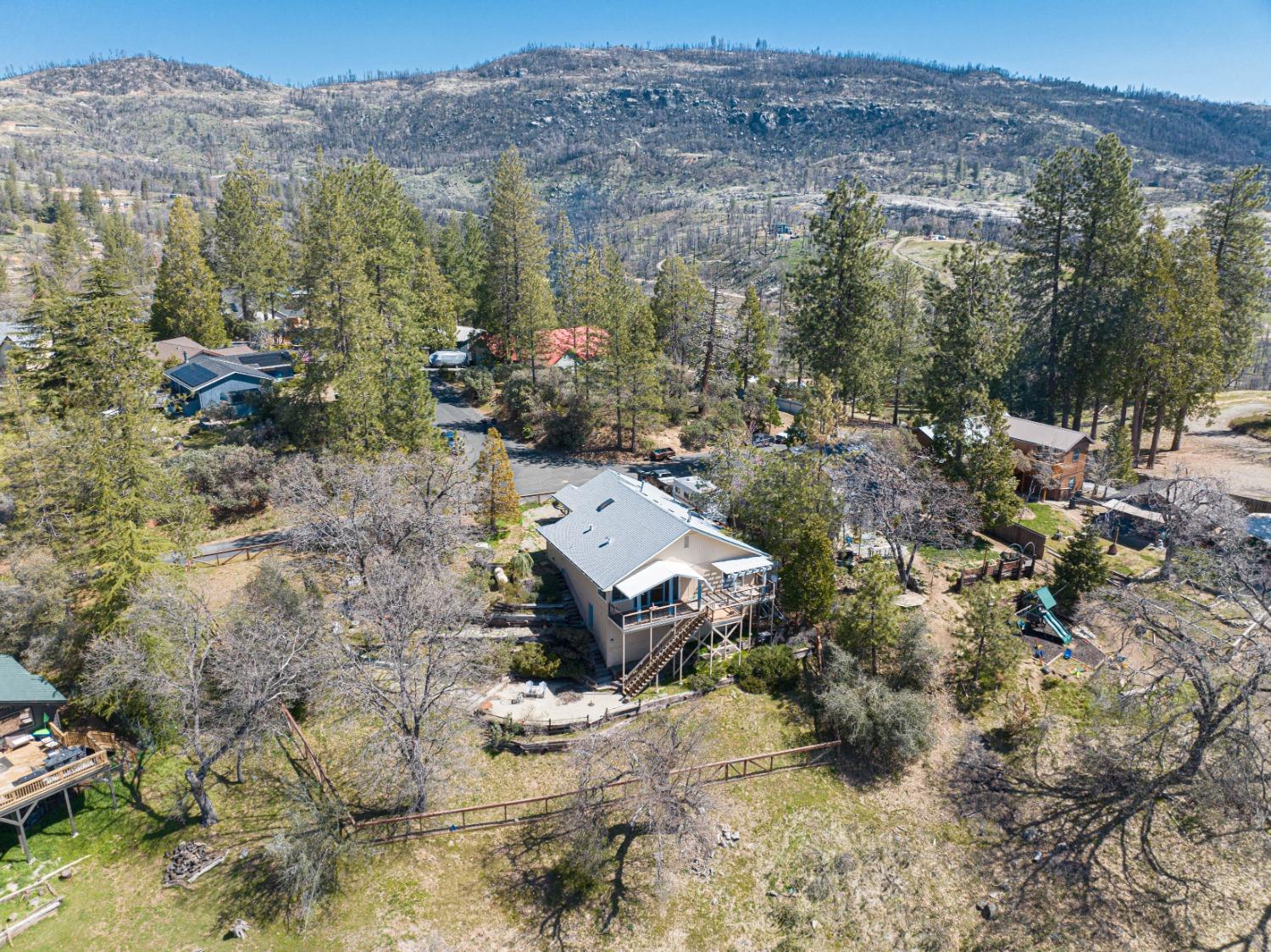 34201 Natoma Road Auberry, CA 93602 - Photo 36 of 40 a aerial view of a house with a mountain