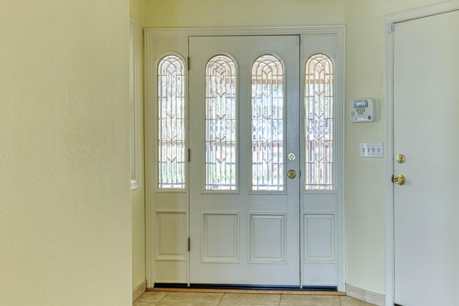 34201 Natoma Road Auberry, CA 93602 - Photo 4 of 40 a view of front door with a mirror