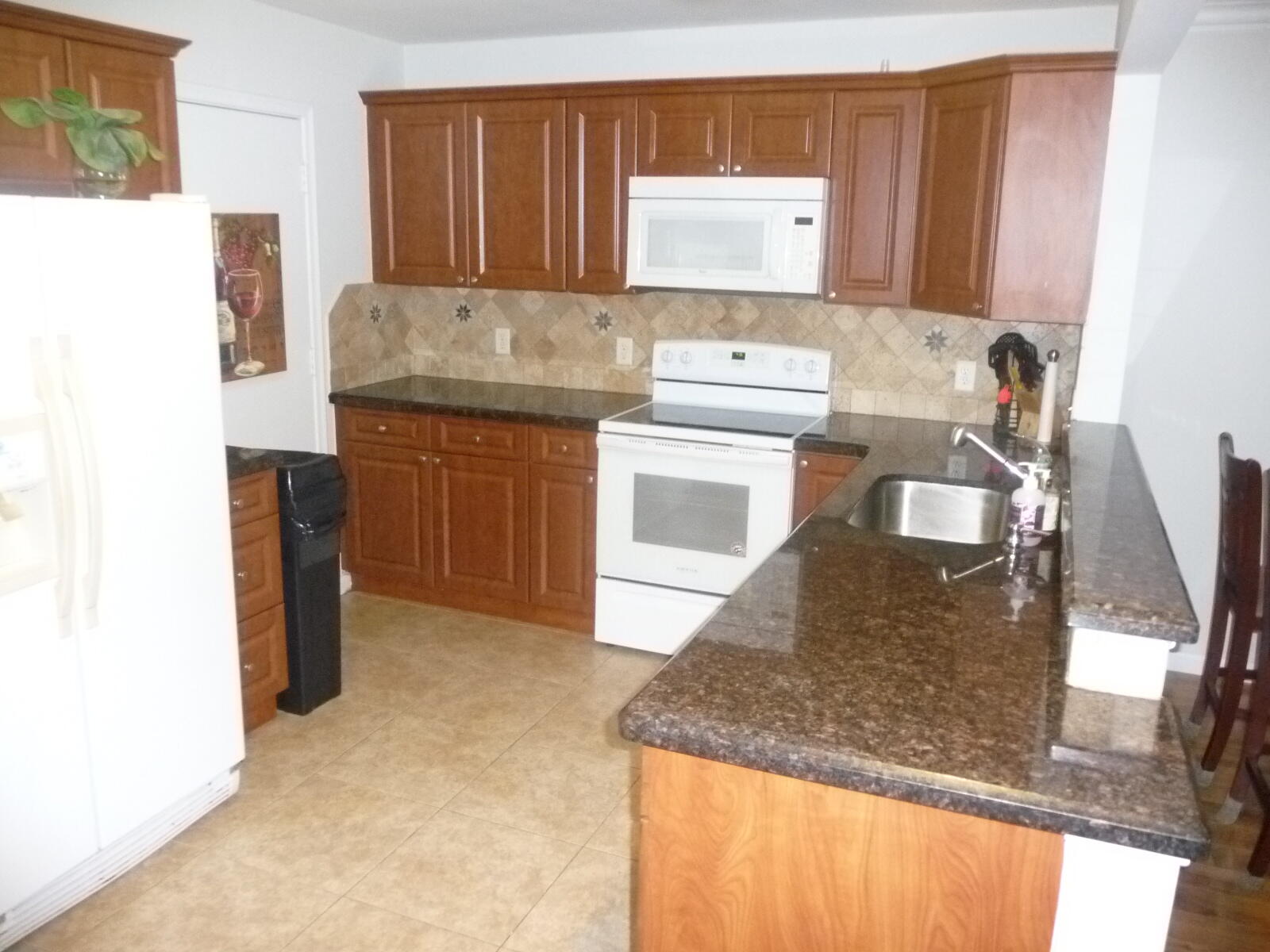 22615 Southwest 66th Avenue, Unit 205 Boca Raton, FL 33428 - Photo 2 of 8 Kitchen