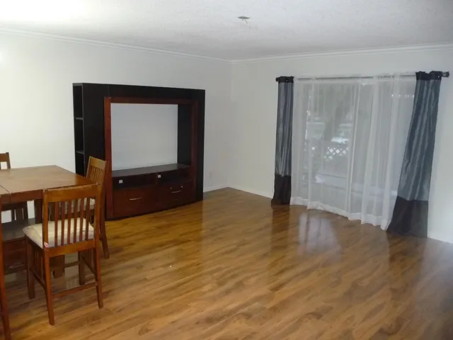a view of livingroom with furniture and wooden floor